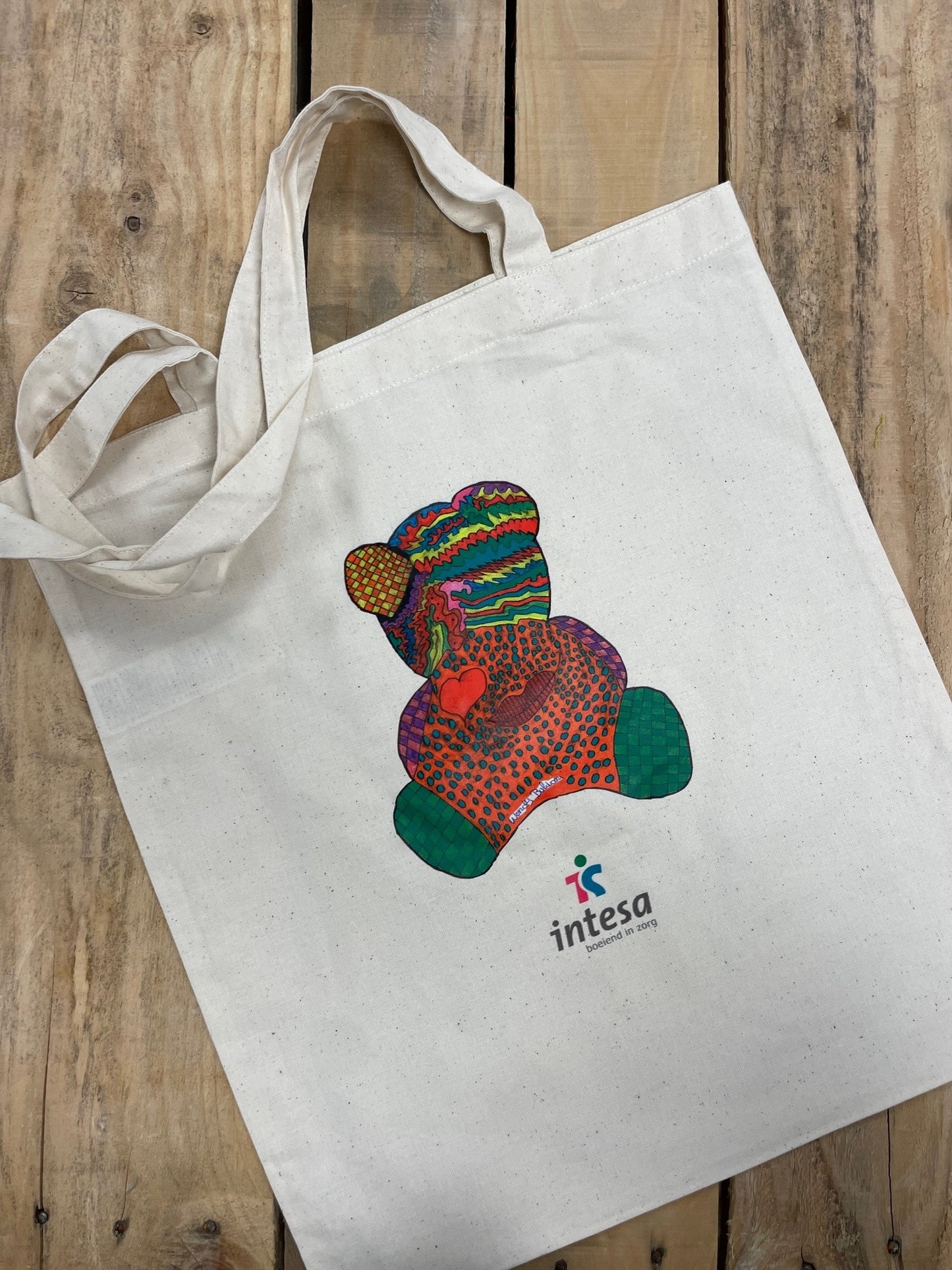 Tas met kunstwerk